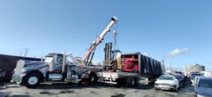 Loading a Forklift on a Conestoga Trailer