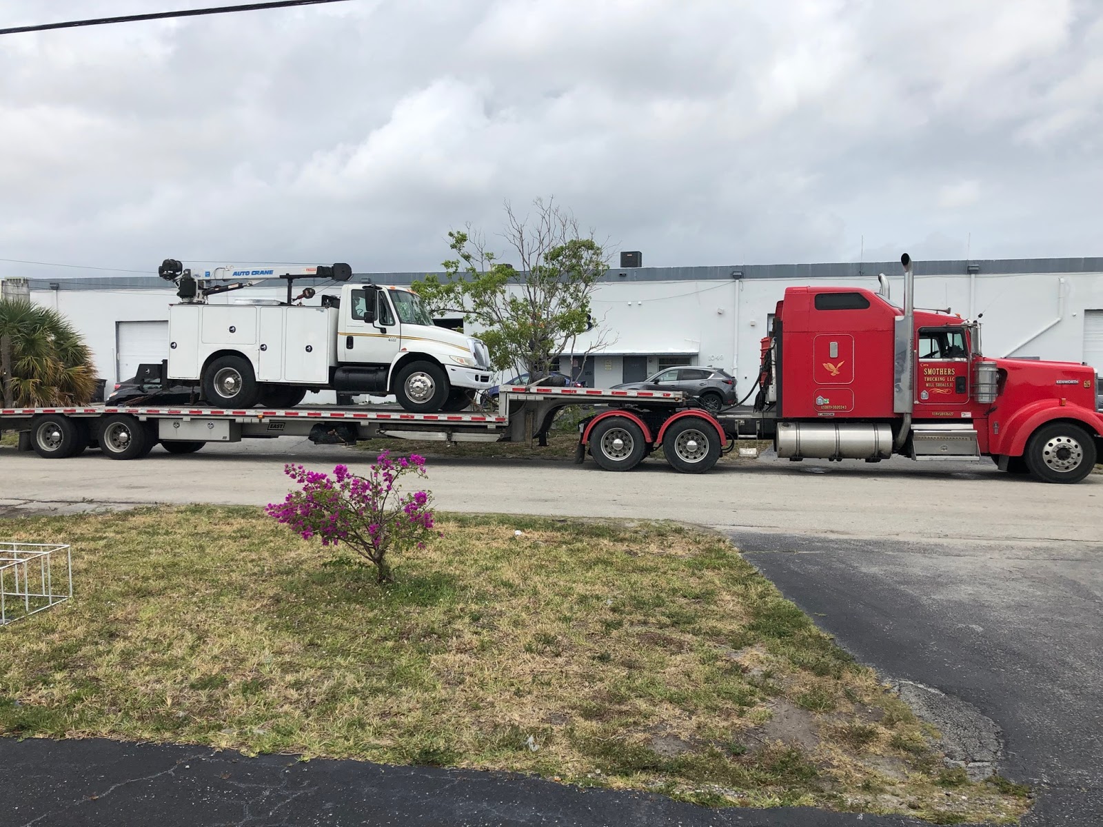 Florida mechanic truck transport on a flatbed