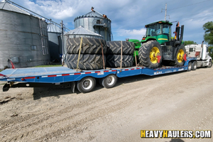 John Deere 9430 tractor haul.