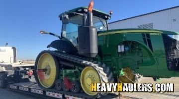 John Deere tractor haul.