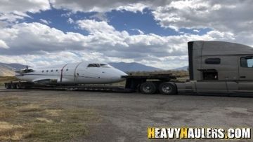 Transporting a fuselage and wings.