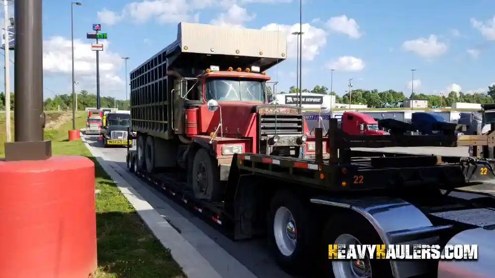 Articulated dump truck transport