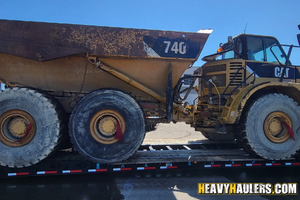 Shipping a CAT 740 haul truck .