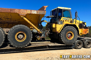 Shipping a CAT 740 haul truck .