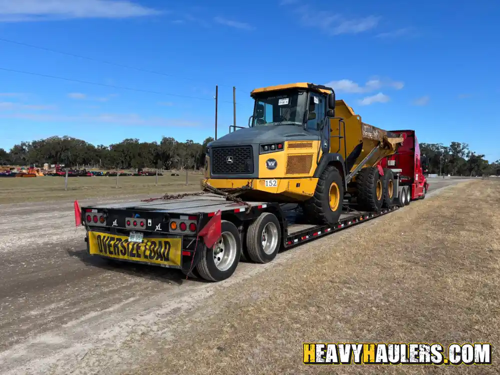 Transporting a John Deere articulated dump truck