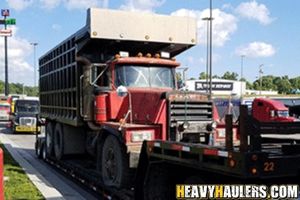 Shipping a dump truck on an RGN trailer.