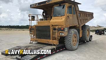 Shipping an oversize articulated dump truck.