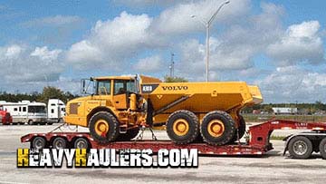 Loading a Volvo articulated dump truck.