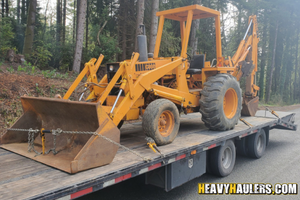 2019 Case 580B backhoe transport.