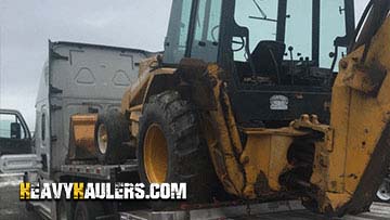 John Deere Backhoe Loader In Transport