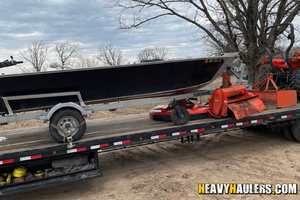 Shipping a 2009 Kubota L3400- 3 implements, paddle boat.