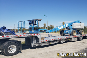 2000 Genie S65 boom lift transport.