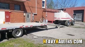 Loading a Terex boom lift.