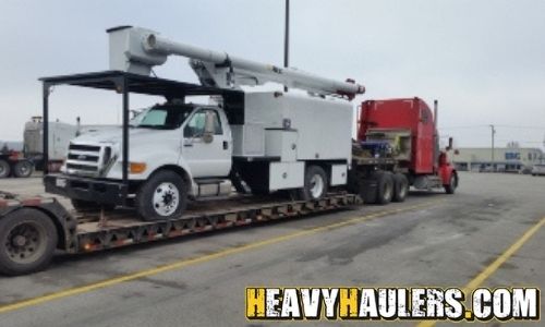 Shipping a Ford bucket truck on an RGN trailer.