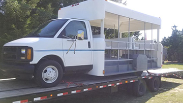 Shipping a custom shuttle bus on a hotshot trailer.