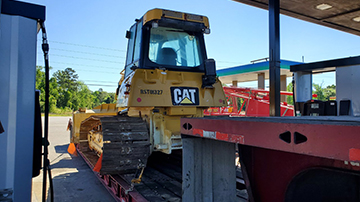 Shipping a Caterpillar bulldozer on an RGN trailer.