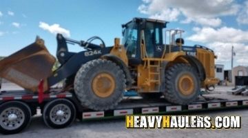 Transporting an oversize John Deere wheel loader.