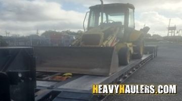 Transporting a backhoe to Texas.