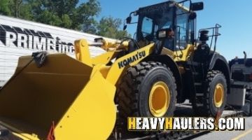 Transporting a Komatsu wheel loader on an RGN trailer.