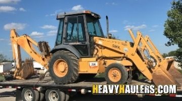 Hauling a backhoe