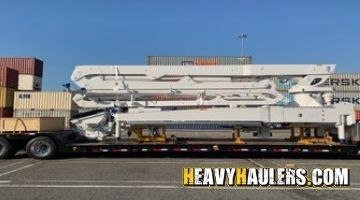 Transporting a 33M concrete boom without chassis to Alaska.