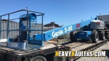 Hauling a Genie boom lift.