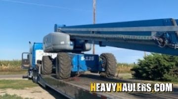 Hauling a Genie boom lift.