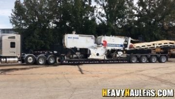 Paver shipped on an RGN trailer.