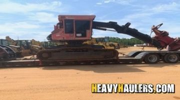Shipping a Valmet excavator on a trailer from Alabama.