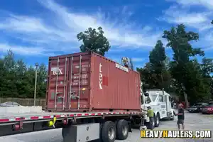 20ft container with construction items haul.