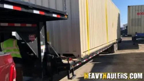 shipping container transport on a trailer