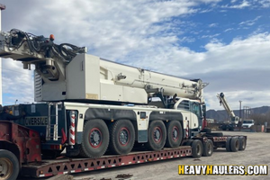 Transporting a 2012 TEREX AC100-4L on an RGN trailer.