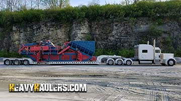 Oversize crushing machine transport.