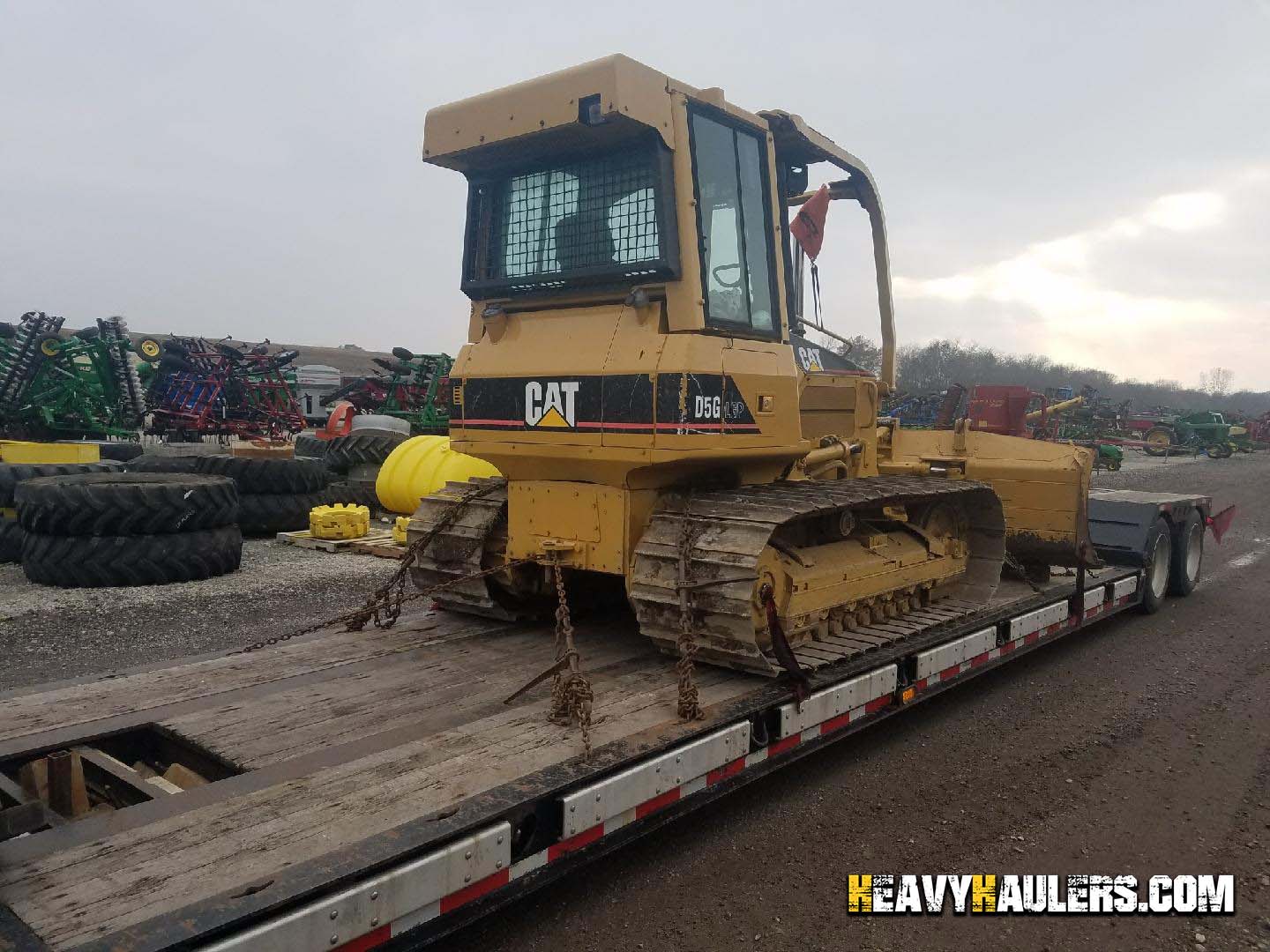 CAT dozer shipped on an flatbed