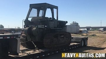 Shipping a dozer on an RGN trailer.