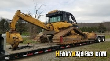 Caterpillar track bulldozer transport.