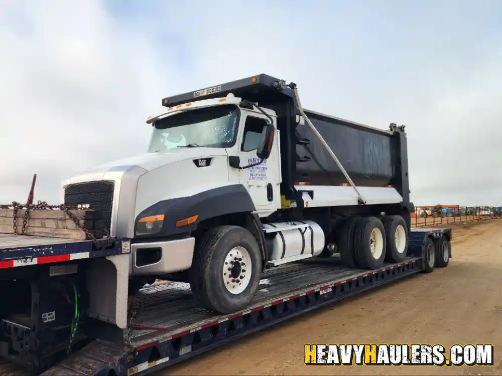 Hauling a 2016 Caterpillar dump truck
