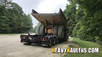 Oversize articulated dump truck transport.