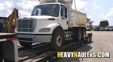 Hauling a Freightliner tadem axle dump truck from Arizona.