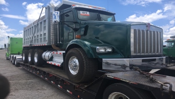 Transporting a Kenworth dump truck within New Jersey.
