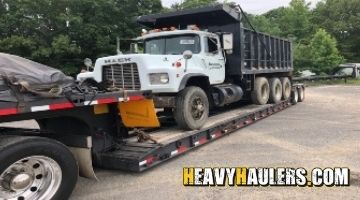 Transporting a Mack dump truck in New Jersey.