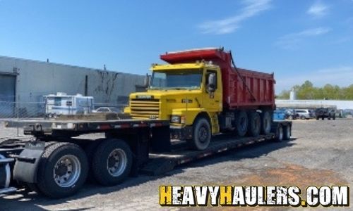 Single axle dump truck transport.