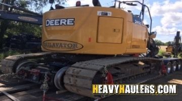 Oversize John Deere excavator transport.