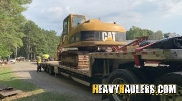 Caterpillar excavator transport.