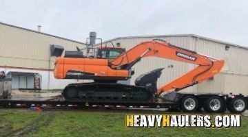 Doosan crawler excavator haul.