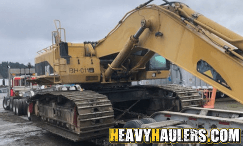 Transporting a an oversize CAT excavator on an RGN trailer.