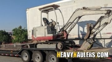 Hauling a Takeuchi mini excavator.