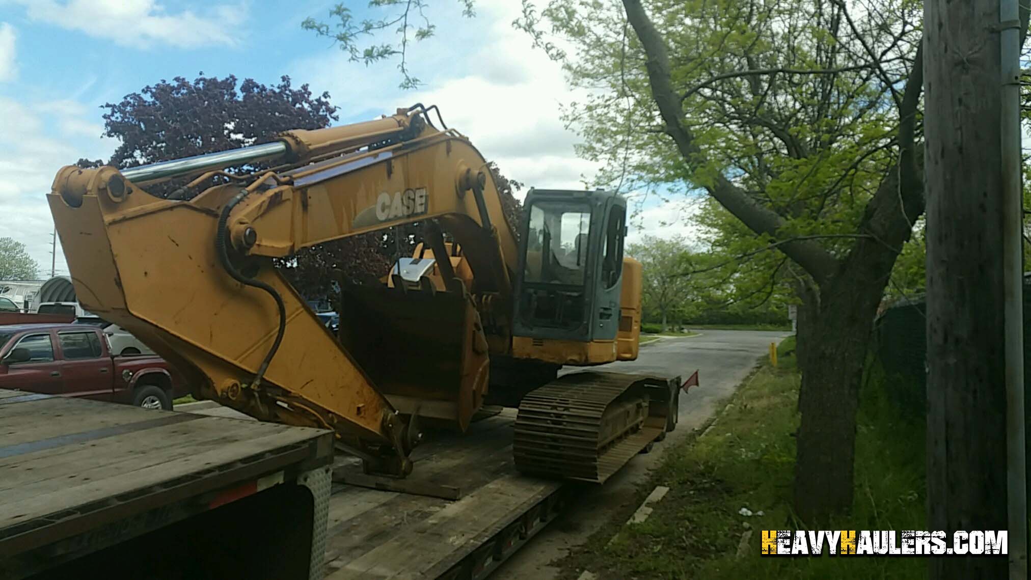 Transporting a Case hydraulic excavator in Maryland.