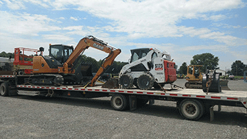 Hydraulic midi-excavator shipping load