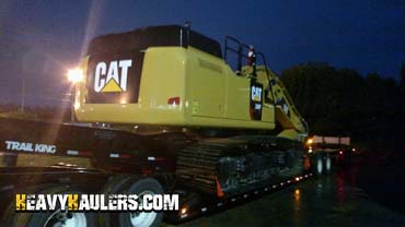 Transporting a Caterpillar hydraulic excavator from Florida.